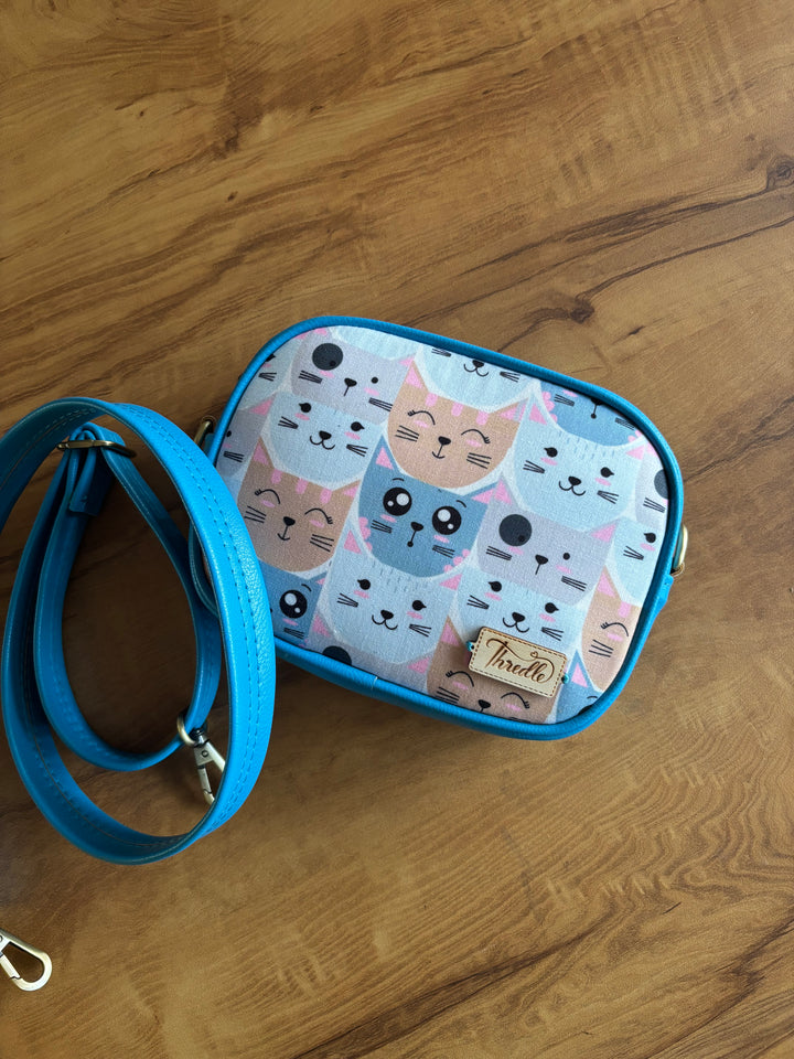 Pastel Cat Print Sling · Blue