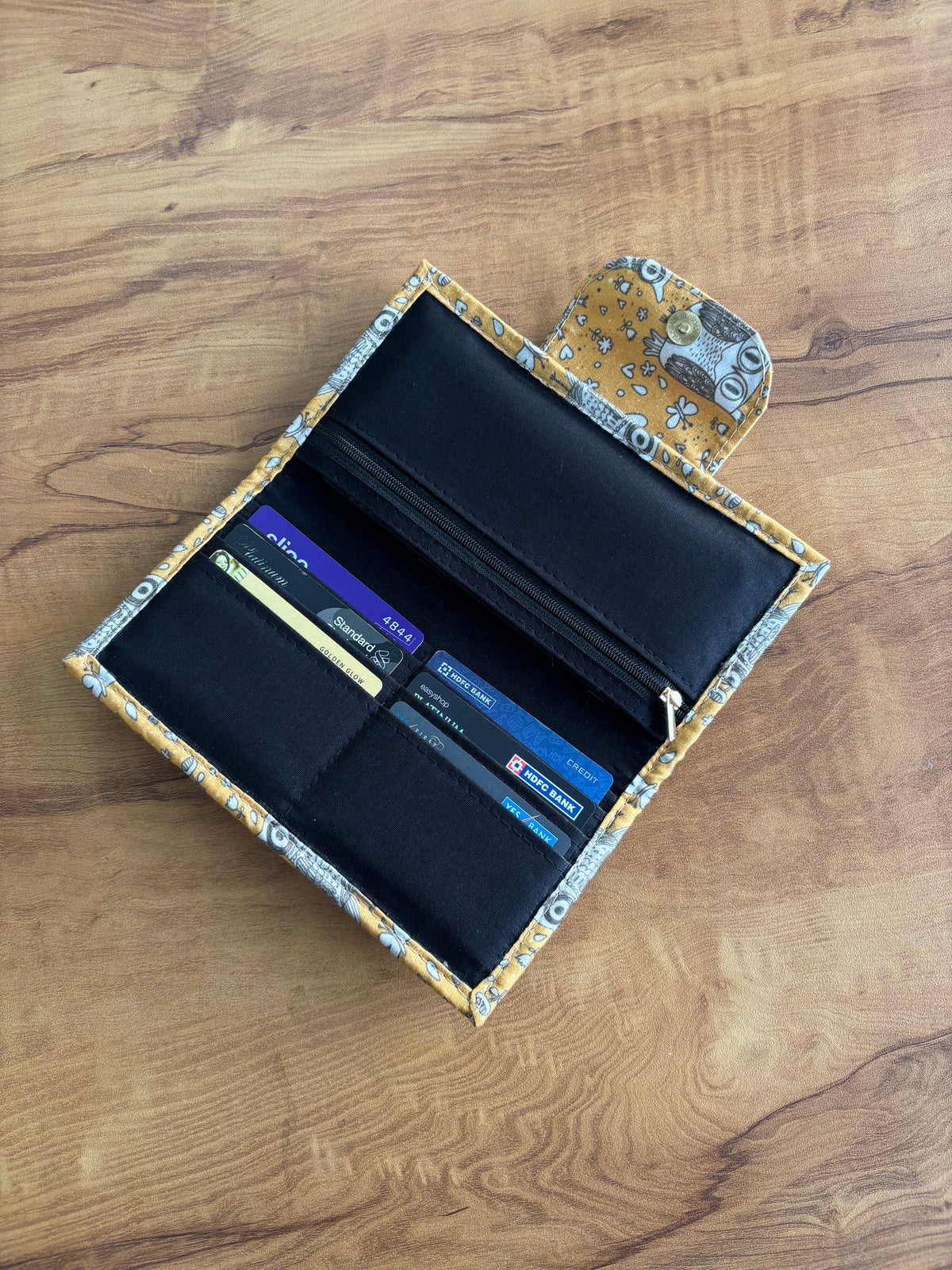 Owl Print Everyday Wallet open, showing card slots, the zip pocket and black lining