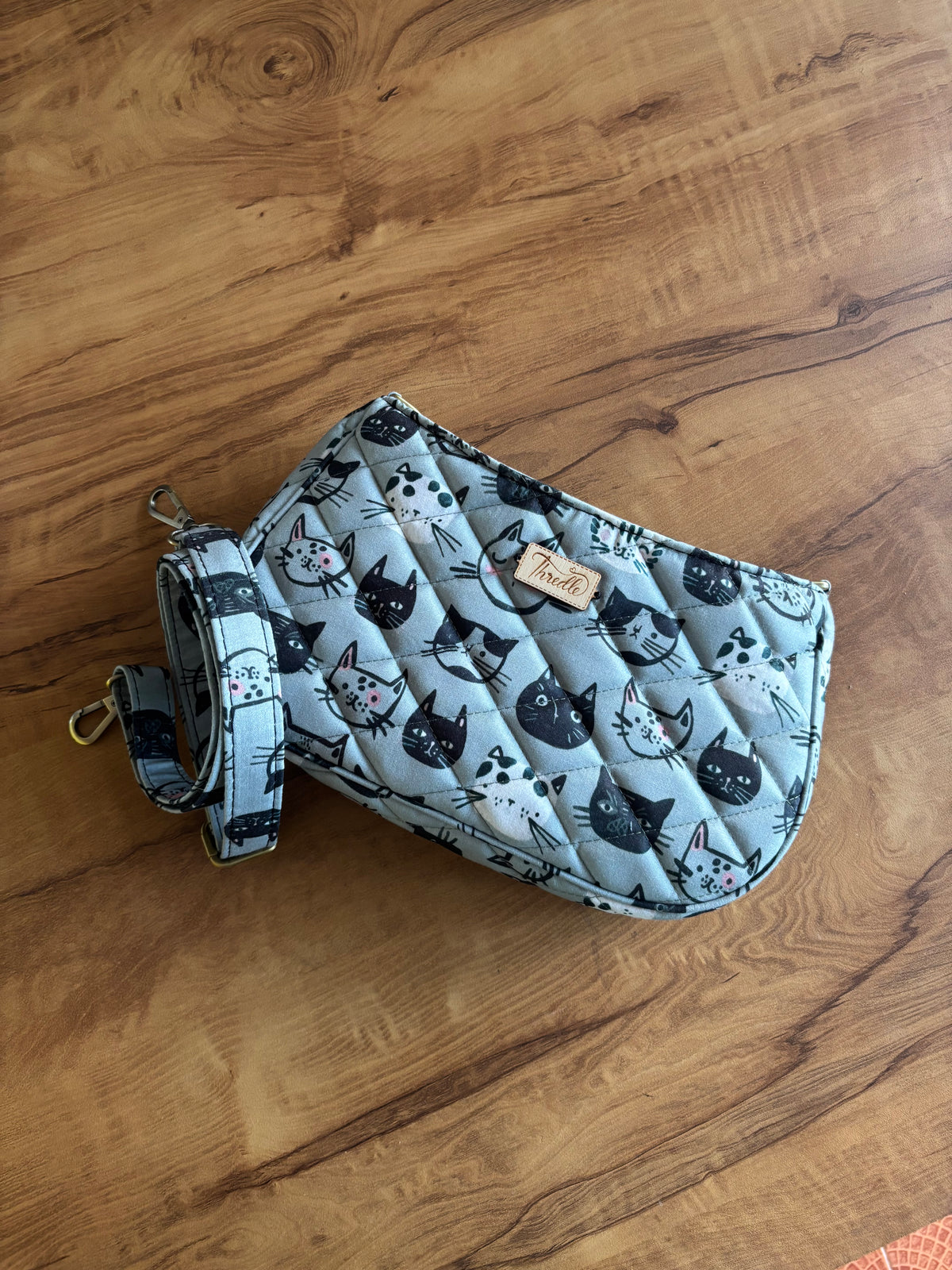 Kitty Faces Quilted Baguette Bag with its matching adjustable strap